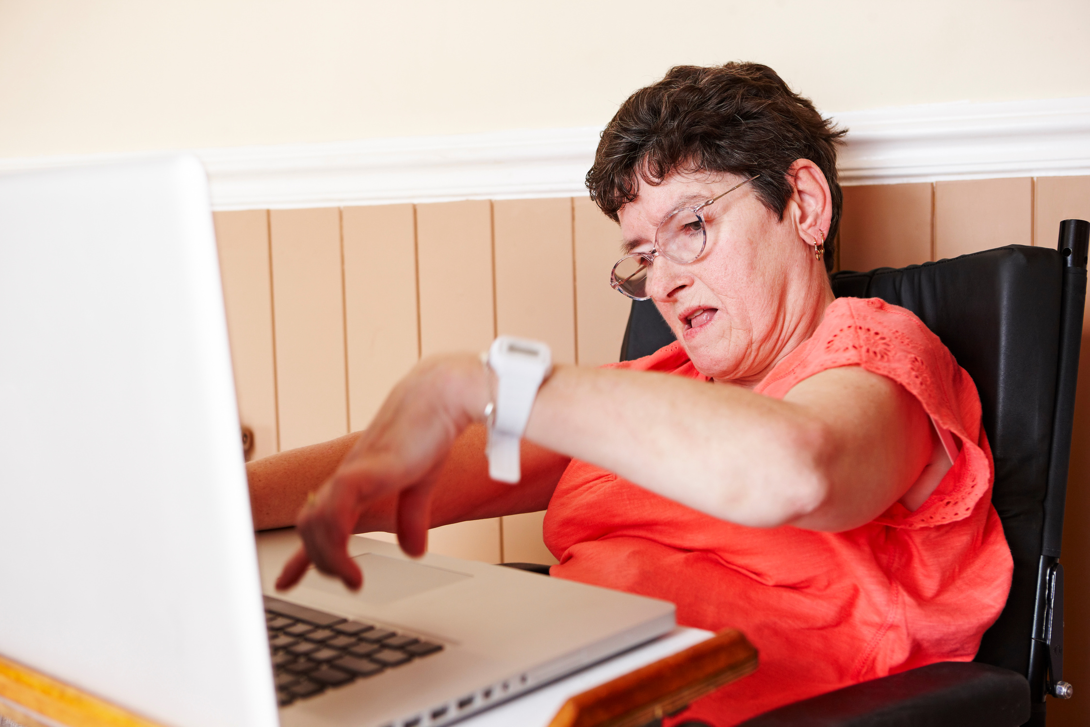 disabled woman working on laptop